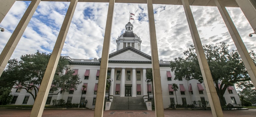A view of the historic Florida Capitol through the columns of the "new" Capitol in Tallahassee. 