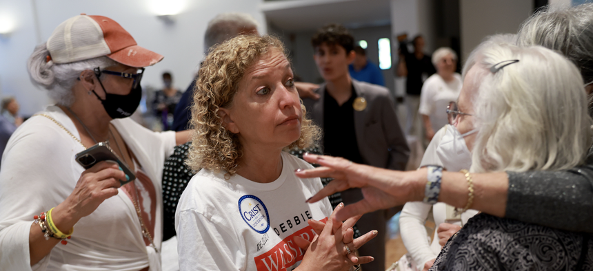 Debbie Wasserman Schultz greets voters as she attends a campaign event at the Pembroke Pines Jewish Center on Aug. 17. 