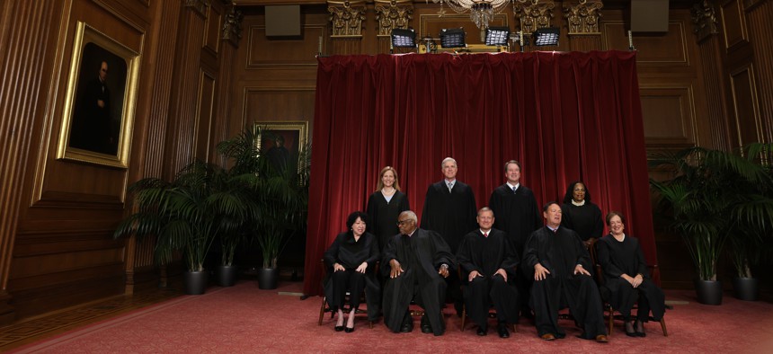 Members of the U.S. Supreme Court pose for their official portrait in the East Conference Room of the Supreme Court building on Oct. 7 in Washington, D.C. 