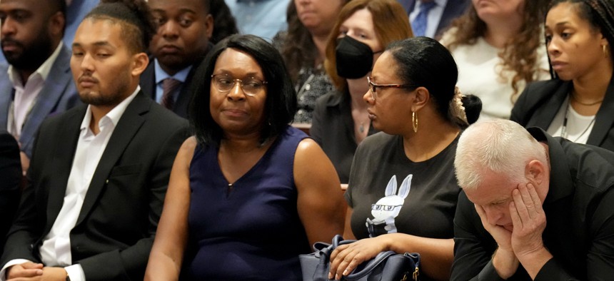 Anne Marie Ramsay, second from left and Vincent Ramsay, right, react as they hear that their daughter's murderer will not receive the death penalty as the verdicts are announced in the trial of Marjory Stoneman Douglas High School shooter Nikolas Cruz at the Broward County Courthouse Oct. 13, 2022 in Fort Lauderdale.