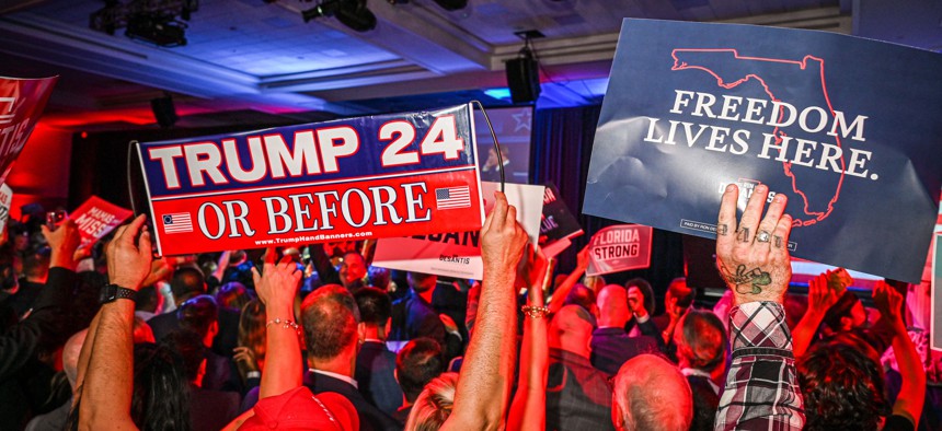 DeSantis supporters cheer during an election night watch party at the Convention Center in Tampa, Nov. 8, 2022.