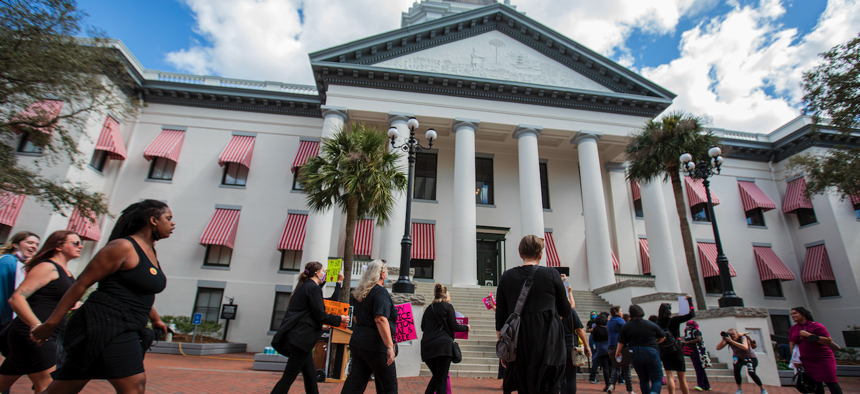Advocates for 'bodily autonomy' march to the Florida Capitol to protest a bill before the Florida legislature to limit abortions on Feb. 16, 2022 in Tallahassee. 