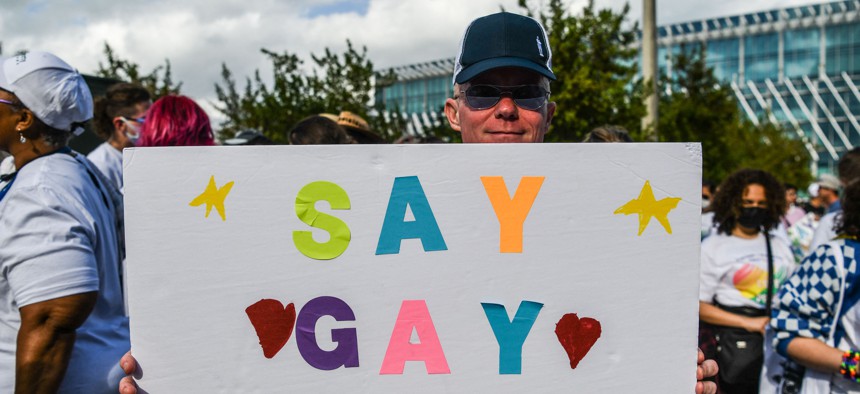 Members and supporters of the LGBTQ community attend the "Say Gay Anyway" rally in Miami Beach, Florida on March 13, 2022.