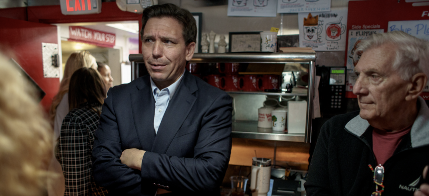 Florida Gov. Ron DeSantis visits a packed Red Arrow Diner, a traditional campaign stop for presidential candidates visiting the surrounding Manchester area, following a policy round table discussion in Bedford, New Hampshire on Friday morning, May 19, 2023. 