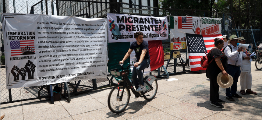 Migrant groups on June 1 protested and called for a boycott against the state of Florida because of its immigration policies. Protesters placed banners outside the U.S. Embassy in Mexico City. 
