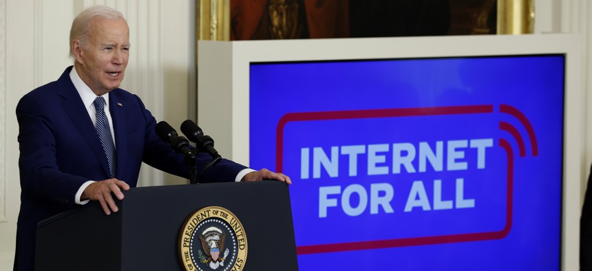 President Joe Biden announces a $42 billion investment in high-speed internet infrastructure during an event in the East Room of the White House. 