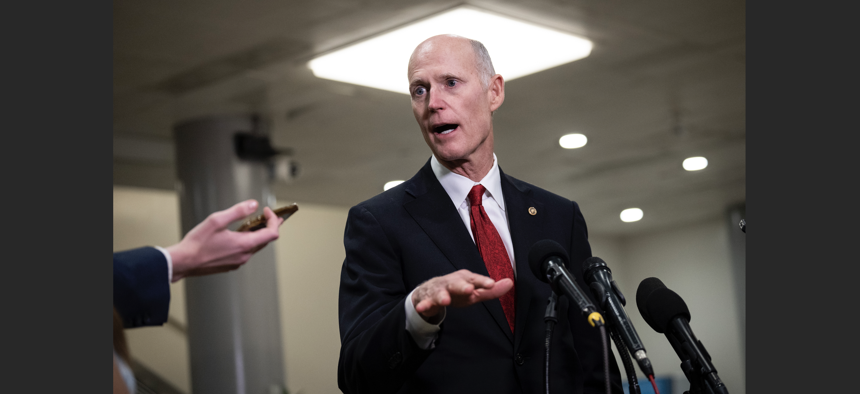 Sen. Rick Scott (R-FL) speaks to reporters on his way to a classified all-Senate briefing on Artificial Intelligence at the U.S. Capitol on July 11, 2023 in Washington, DC. 