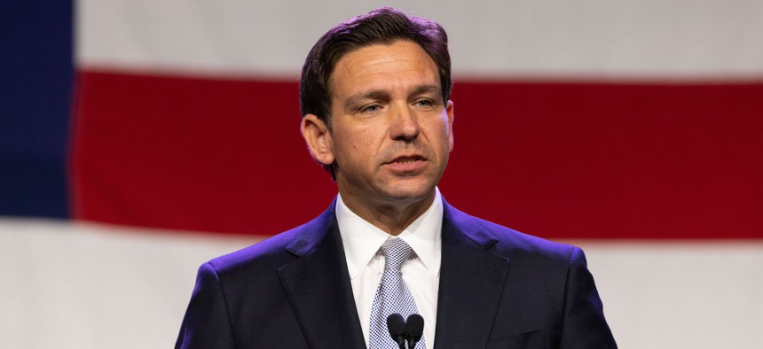 Gov. Ron DeSantis speaks during the Republican Party of Iowa 2023 Lincoln Dinner on July 28. The governor has frequently used fiery rhetoric and previously vowed to, if elected, eliminate the departments of Commerce, Education and Energy, as well as the Internal Revenue Service.
