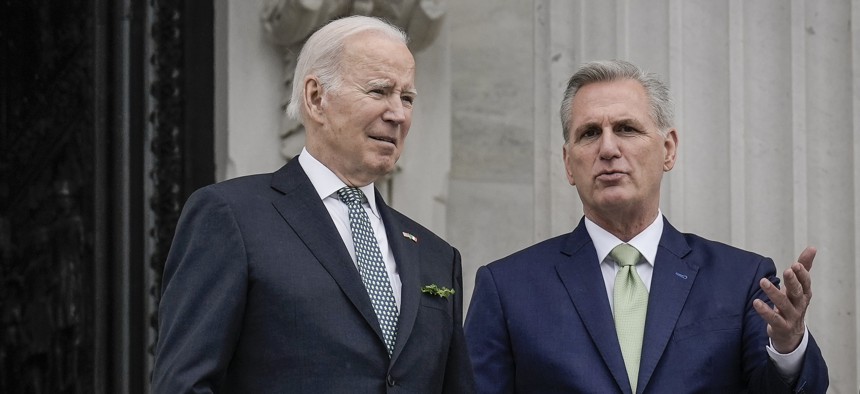 President Joe Biden and House Speaker Kevin McCarthy talk as they depart the U.S. Capitol following the Friends of Ireland Luncheon on Saint Patrick's Day, March 17, 2023 in Washington, D.C. 