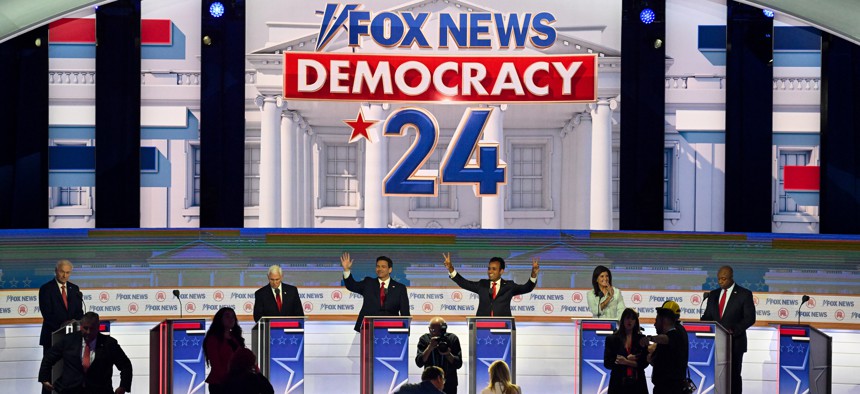 Candidates take to their lecterns at the first Republican presidential debate hosted by Fox News at the Fiserv Forum, Wednesday, August 23, 2023 in Milwaukee, Wisconsin. 