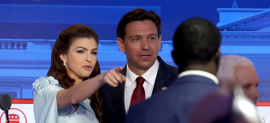 Florida Gov. Ron DeSantis stands with wife Casey at the end of the FOX Business Republican Primary Debate at the Ronald Reagan Presidential Library on September 27, 2023 in Simi Valley, California. 