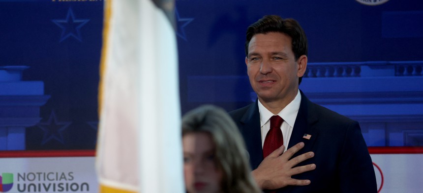 Republican presidential candidate and Florida Gov. Ron DeSantis stands for the national anthem during the FOX Business Republican Primary Debate at the Ronald Reagan Presidential Library on September 27, 2023 in Simi Valley, California. 
