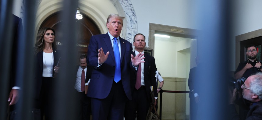 Former U.S. President Donald Trump speaks to the media after exiting the courtroom for a lunch recess during the first day of his civil fraud trial at New York State Supreme Court on Oct. 2, 2023 in New York City.  